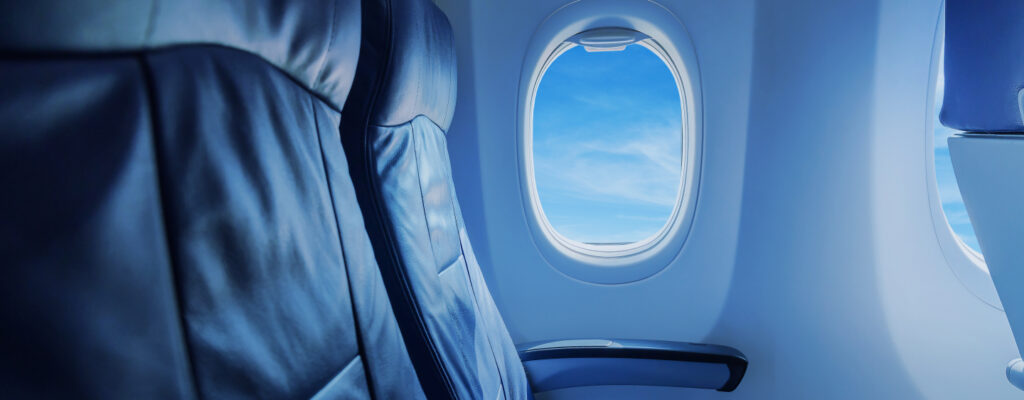 Qantas Deep Dive Header Image - A plane Isle with window view